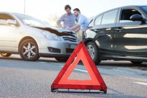 Car Accident Injuries from Road Debris—Who Can You Sue for Damages?
